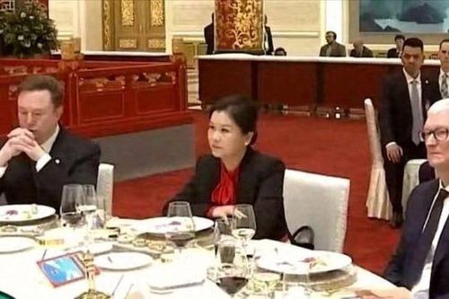Chuyện về người phụ nữ ngồi giữa Elon Musk và Tim Cook trong buổi quốc yến ở Bắc Kinh