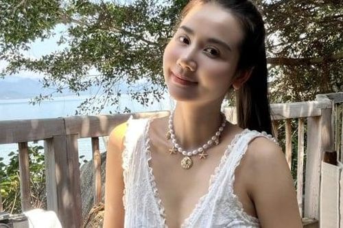 Huyền Lizzie khoe lưng trần hút mắt ở biển hè