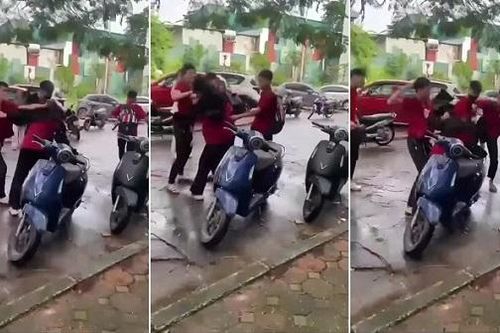 Nhóm mặc 'áo đỏ' đánh một thanh niên ở Hà Nội
