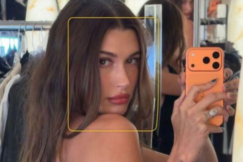 Hailey Bieber diện sơ mi ren xuyên thấu
