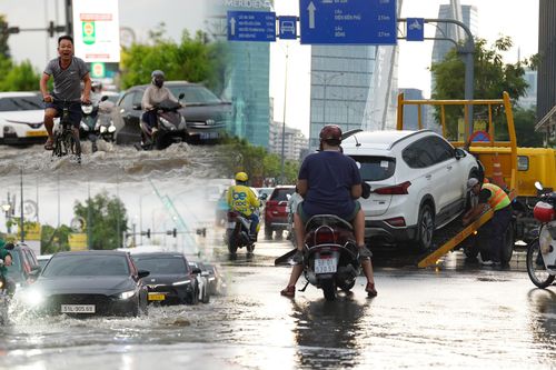 Mưa lớn ngập chân cầu Ba Son, loạt xe chết máy, ô tô phải gọi cứu hộ