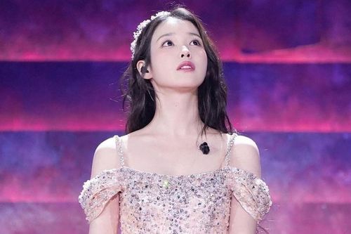 IU bất ngờ trở lại với ca khúc mới sau khi hoãn album và tour diễn