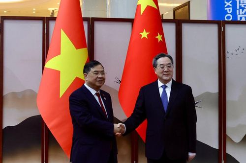 Phó Thủ tướng Thường trực Chính phủ Phạm Gia Túc hội đàm với Phó Thủ tướng Thường trực Quốc vụ viện Trung Quốc Đinh Tiết Tường