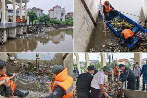 Cảnh sát cơ động Hà Nội vớt rác, thông dòng trạm bơm chống ngập