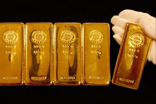 Giá vàng thế giới, dầu thô đồng loạt giảm sau quyết định của Fed