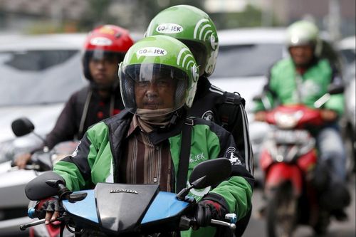 Grab, GoJek chi trả an sinh cho đối tác tài xế ở các nước như thế nào?