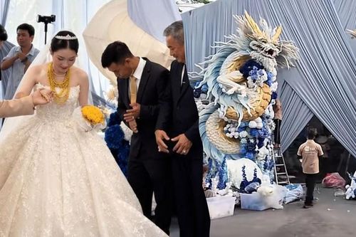 Con trai chủ tiệm vàng cưới vợ, cổng long - phụng dài 50m gây choáng