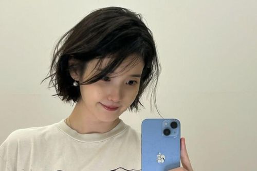 IU 'xả kho' loạt ảnh tóc ngắn làm quà Trung thu khiến fan thích thú