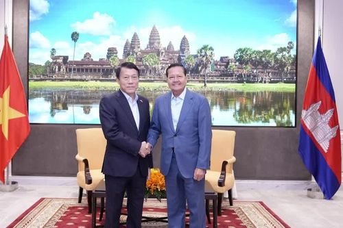 Bộ trưởng Lương Tam Quang chào xã giao Phó Thủ tướng thứ nhất Campuchia Neth Savoeun