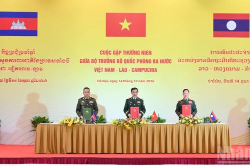 [Ảnh] Cuộc gặp giữa ba Bộ trưởng Quốc phòng Việt Nam-Lào-Campuchia