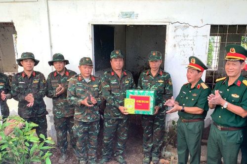 Tiếp sức lực lượng tìm kiếm quy tập hài cốt liệt sĩ