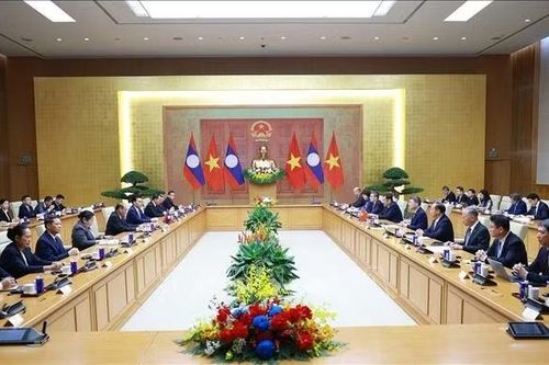 Thủ tướng Lê Minh Hưng hội kiến Thường trực Ban Bí thư Lào