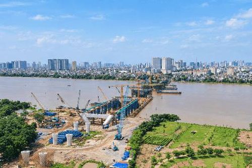 Bảy cây cầu vượt sông Hồng: Tăng tốc, giữ nhịp tiến độ