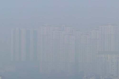 Hà Nội ô nhiễm không khí, nhà cao tầng trở nên 'tàng hình'