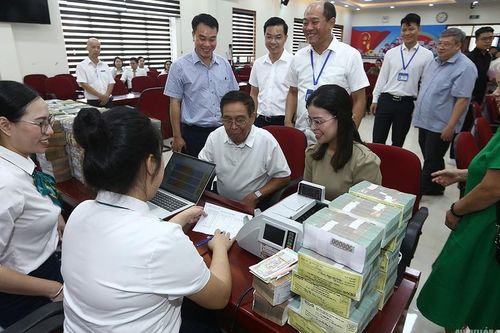Người dân Định Công nhận tiền bồi thường, đồng lòng bàn giao mặt bằng