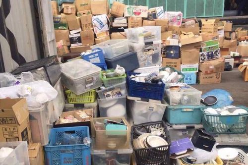 Công ty môi giới bất động sản 'ma' nhập lậu 2 container chén, đĩa cũ