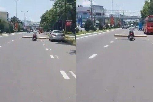 Clip: Người phụ nữ chở đồ cồng kềnh ung dung 'làm xiếc' trên phố