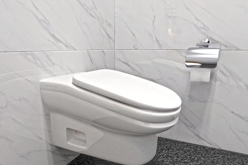 Để ngăn ngừa nhân viên sử dụng điện thoại thông minh lúc đi vệ sinh, một công ty đã thiết kế ra toilet khiến nhân viên không thể ngồi quá 5 phút