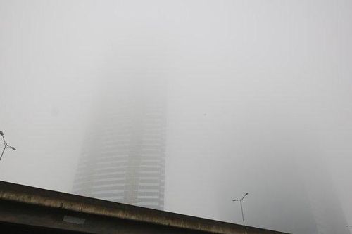 Chùm ảnh: Hà Nội 'hóa' Sapa mờ sương