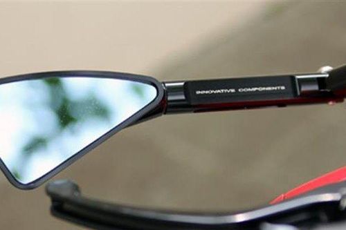 Điều khiển xe máy không gương chiếu hậu bị phạt bao nhiêu tiền?