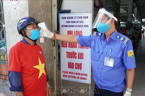 Hàng nghìn tiểu thương Đà Nẵng mặc áo in hình cờ Tổ quốc