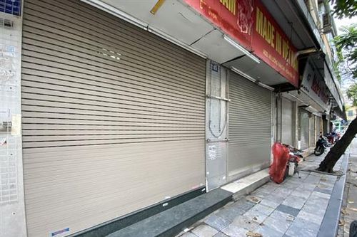 Hà Nội: Hàng quán 'cửa đóng then cài' vì Covid-19