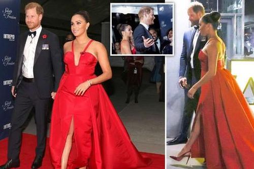 Meghan Markle diện đầm đỏ lộng lẫy, nắm tay Hoàng tử Harry không rời trên thảm đỏ