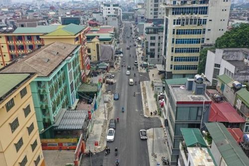 Hà Nội: Mặt đường Vũ Trọng Phụng thay 'áo mới' hết cảnh khói bụi, tắc đường