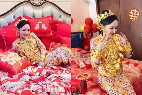 Cô dâu khoe vàng đeo trĩu cổ, nằm trên giường cưới rải hàng xấp tiền khiến dân tình thầm ghen tị