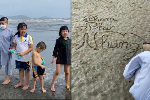 Cảm động hình ảnh con nuôi Phi Nhung viết tên mẹ trên cát biển
