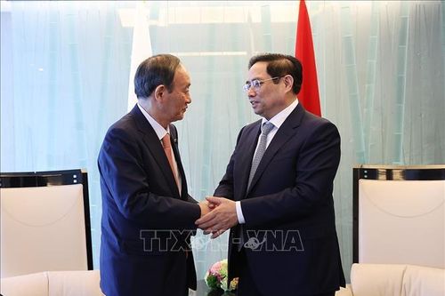 Thủ tướng Phạm Minh Chính tiếp cựu Thủ tướng Nhật Bản Suga Yoshihide