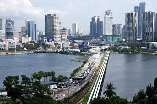 Singapore, Malaysia mở lại biên giới đường bộ cho người đã tiêm chủng