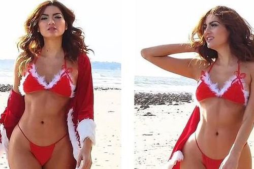 Sao Hollywood diện bikini bé xíu, hóa 'bà già Noel' nóng bỏng trên bãi biển