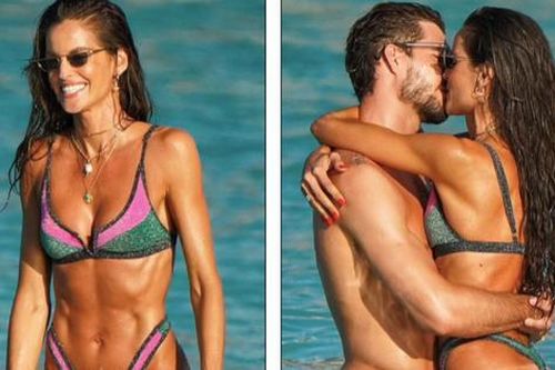 Nàng WAGs nóng bỏng nhất tuyển Đức phô body tượng tạc, liên tục ôm hôn bạn trai ở biển