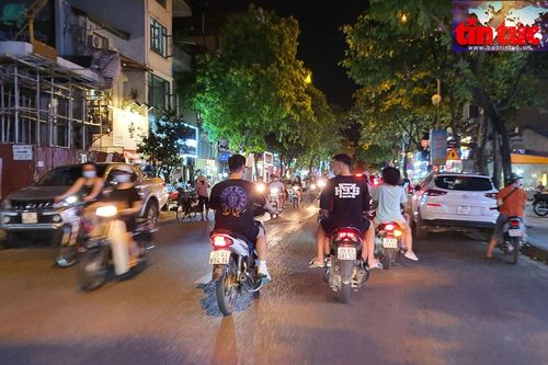 Đi xe gắn máy không đội mũ bảo hiểm bị phạt gấp đôi mức hiện hành
