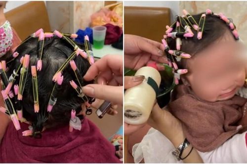 Đưa con gái 1,5 tuổi đi uốn xoăn tóc làm đẹp dịp Tết, người mẹ lẫn chủ tiệm tóc bị dân mạng mắng xối xả