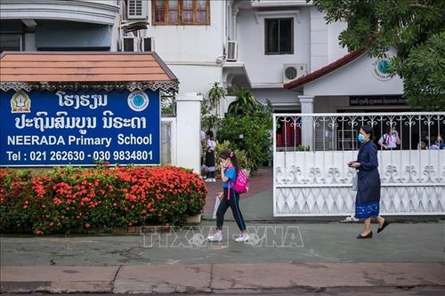 Sống chung an toàn với COVID-19: Lào áp dụng quy trình 'trường học an toàn'
