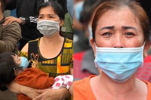 Bế cháu đợi tiễn con trai lên đường nhập ngũ từ 5h sáng