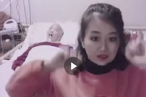 Người phụ nữ gây tranh cãi vì nhảy múa trước mặt chồng bại liệt