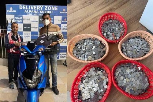 Người đàn ông Ấn Độ mang bao tải tiền xu đi mua xế xịn