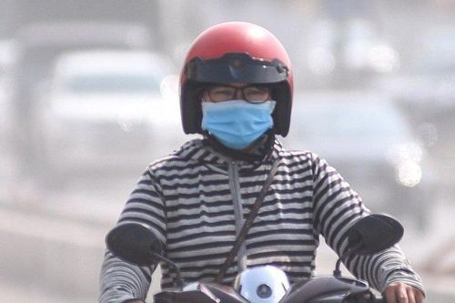 Sương mù, bụi bẩn bao phủ Hà Nội