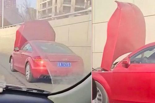 Nữ tài xế Audi vẫn lái 'phăm phăm' dù nắp ca-pô dựng ngược, che hết tầm nhìn