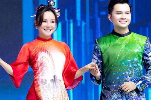 Bỏ qua ồn ào, Vy Oanh làm người mẫu trong BST áo dài Việt Hùng