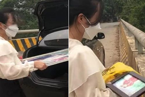 'Nóng giận mất khôn', người phụ nữ đem ảnh cưới quẳng xuống sông liền bị chỉ trích bởi 2 lý do này