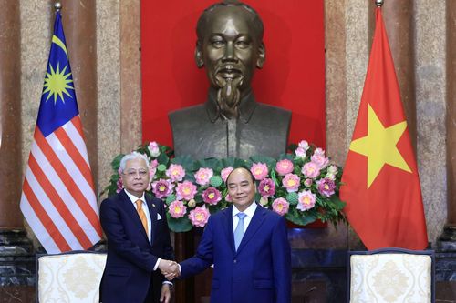 Hình ảnh Chủ tịch nước Nguyễn Xuân Phúc tiếp Thủ tướng Malaysia
