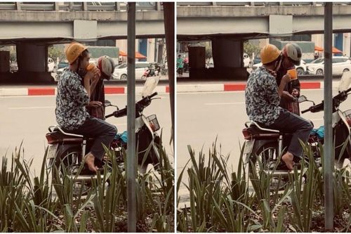 Cụ ông dừng xe rót nước cho cháu và hành động sau đó của cậu bé lay động triệu trái tim