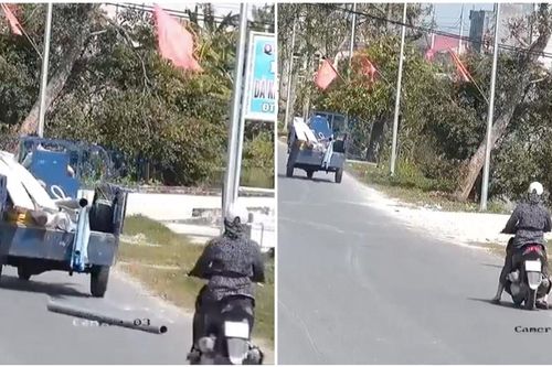 Thấy xe ba gác rơi đồ, nữ tài xế có hành động này khiến người khen người trách