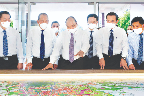 Chủ tịch Nước Nguyễn Xuân Phúc dự Hội nghị xúc tiến đầu tư vào huyện Hóc Môn và Củ Chi, TP. Hồ Chí Minh