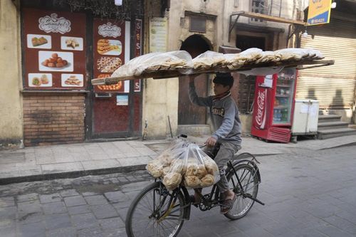 Nga-Mỹ cáo buộc nhau khiến giá thực phẩm nhiều nơi tăng