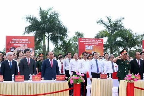 Chùm ảnh: Chủ tịch nước Nguyễn Xuân Phúc dự Lễ thượng cờ Thống nhất non sông